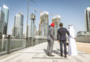 businessmen-discussing-city-development-in-suits